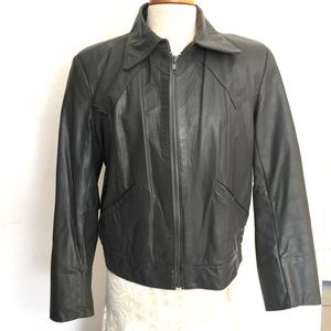 100% genuine leather bomber jacket. Excellent condition. Small. Trego’s Westwear